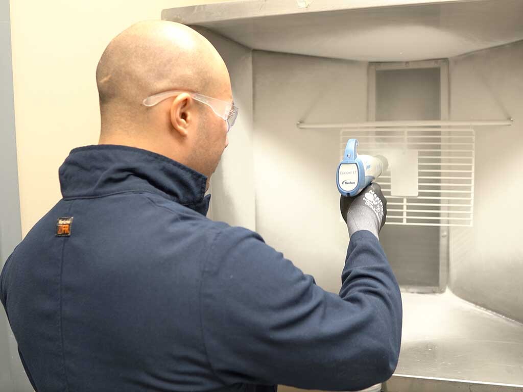 Spray coating with powder coatings