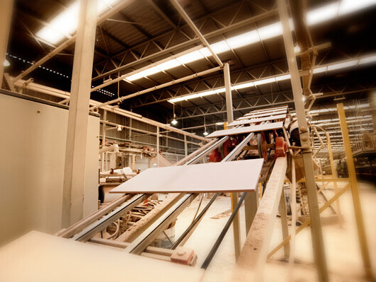 Tile production with grinding aids for ceramics